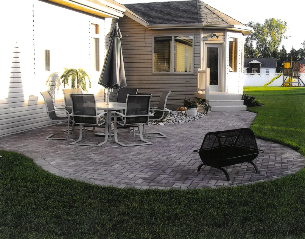 SKM_C451i24121116380 Outdoor brick patio.