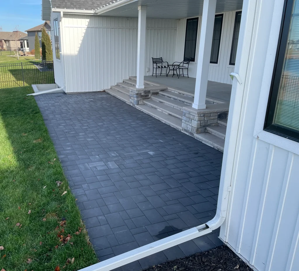 FullSizeRender Dark masonry outdoor backyard patio.