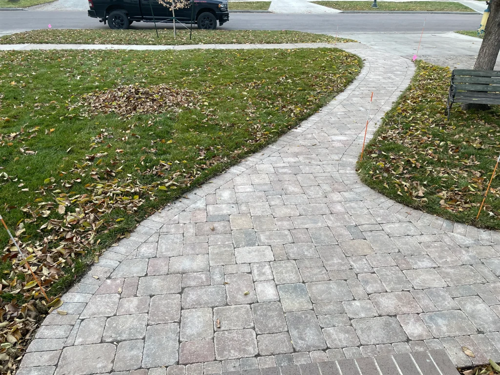 IMG_1610 Front yard brick walkway leading to sidewalk.