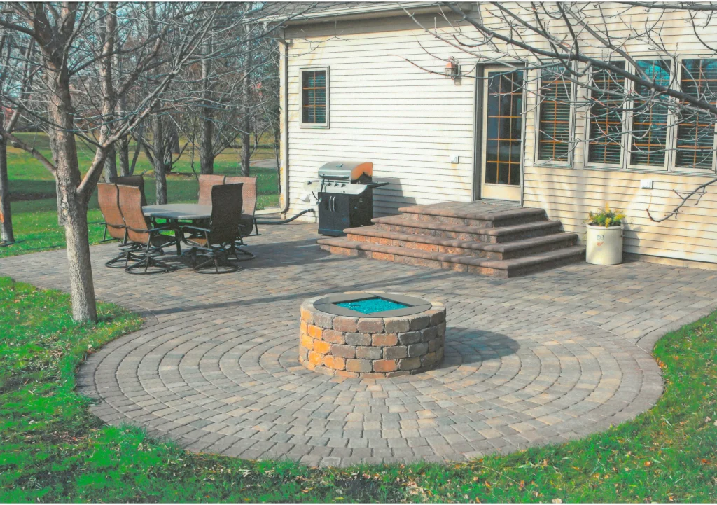SKM_C451i24121716200_EDIT Brick backyard patio with firepit.