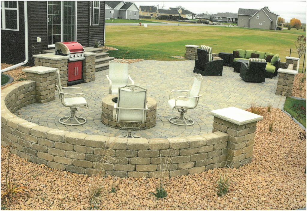 SKM_C451i24121716440_EDIT Brick patio with fireplace, brick columns, brick ledge.